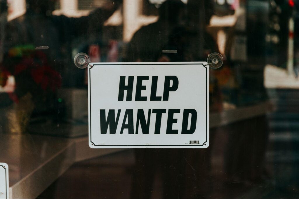 Modern recruitment agency team leveraging digital tools and data to attract top talent.
